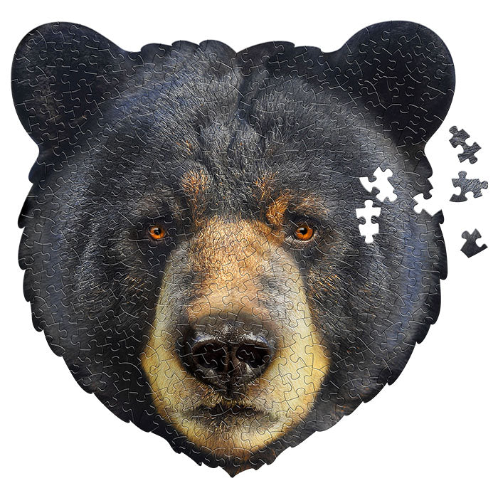 I Am Bear 300 pc. Puzzle: A uniquely shaped 300-piece jigsaw puzzle depicting a bear's face, complete with educational Madd Capp Fun Facts booklet.