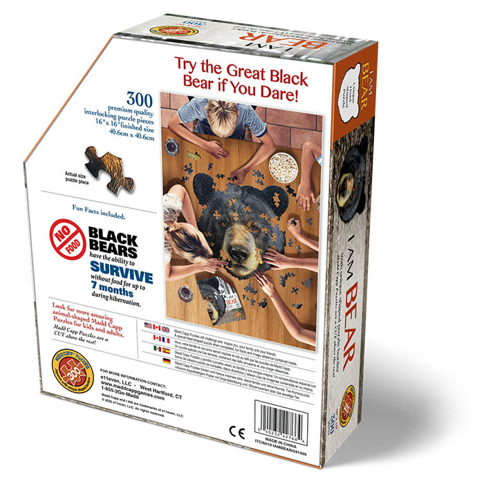 I Am Bear 300 pc. Puzzle: Box featuring people assembling a bear-shaped jigsaw puzzle, includes educational booklet and poster.