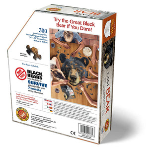 I Am Bear 300 pc. Puzzle: Box featuring people assembling a bear-shaped jigsaw puzzle, includes educational booklet and poster.