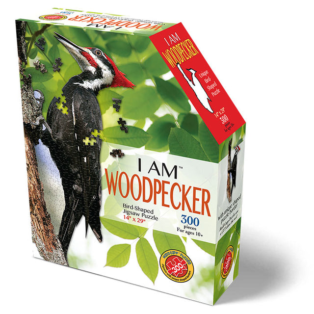 I Am Woodpecker 300 pc. Puzzle: Box shows a photo-realistic woodpecker jigsaw puzzle, includes educational booklet and poster with fun facts.