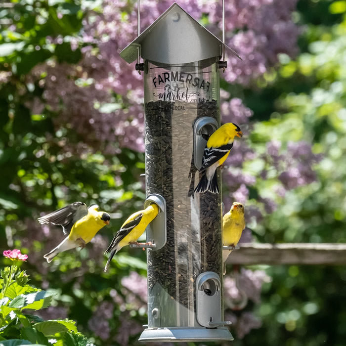 Farmhouse Deluxe Easy Clean Feeder with multiple birds feeding from its six ports, showcasing its efficient design and appeal to bird enthusiasts.