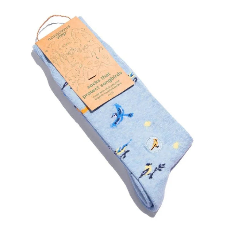 Conscious Step light blue songbird socks with colorful bird designs, folded with eco-friendly packaging