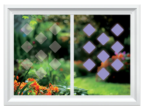 Window with decorative film showing a geometric pattern with purple shapes, set against a blurred garden background.