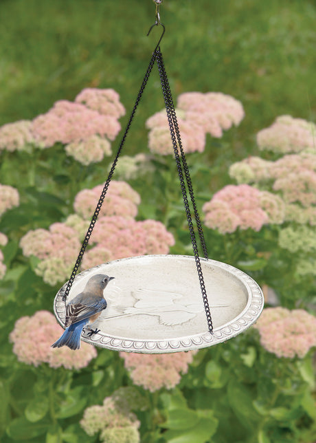 Audubon Hanging Bird Bath with embossed Egret design, durable polyresin, hanging chain, and textured 1-1/4 inch deep basin for birds to drink and bathe.