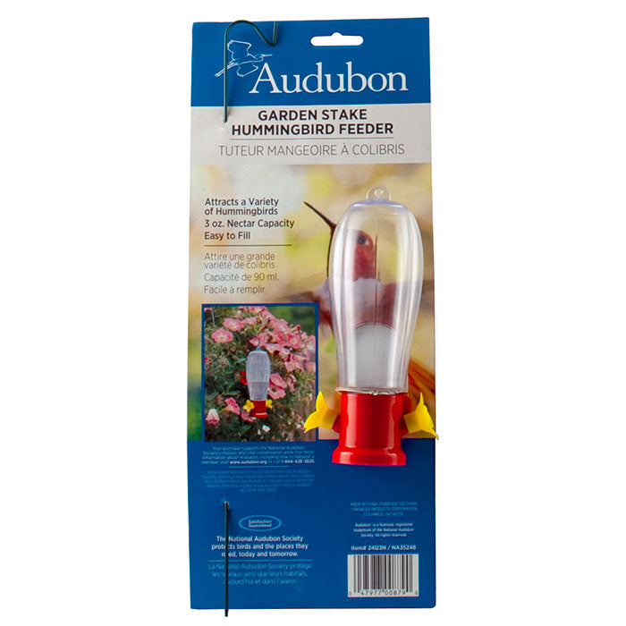 Garden Stake Hummingbird Feeder & Hanging Rod in packaging, showing a shatterproof clear plastic feeder with two feeding ports, ready to hang in your garden or patio.