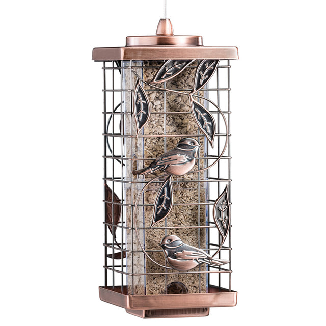 Caged Leaf Tube Feeder with copper finish, featuring a squirrel-resistant design, four feeding ports, and a leaf motif, hanging with birds feeding inside.