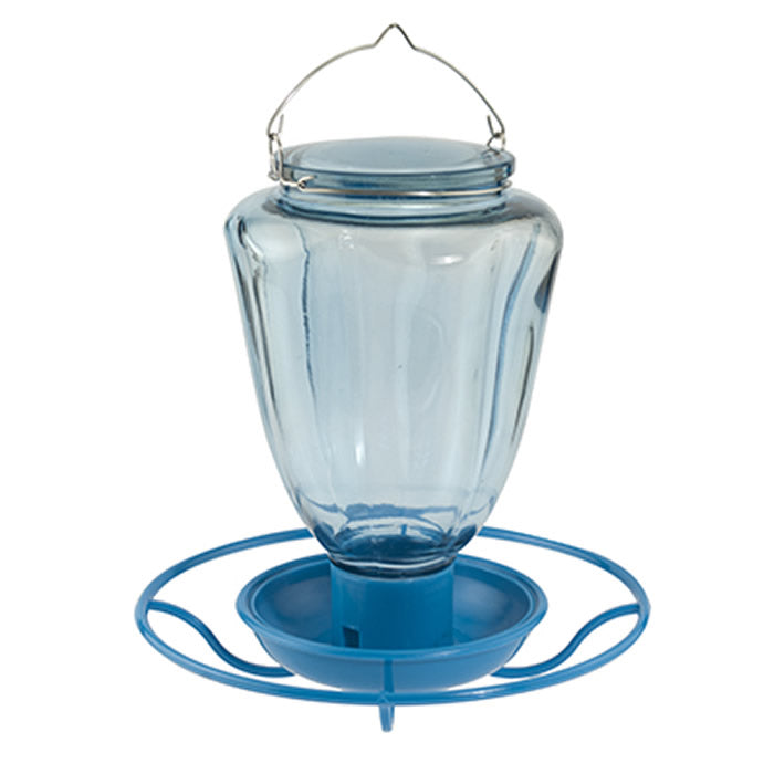Close-up of the 32 oz. Glass Waterer with a blue wire hanger and wraparound perch for birds to drink from a clear reservoir.