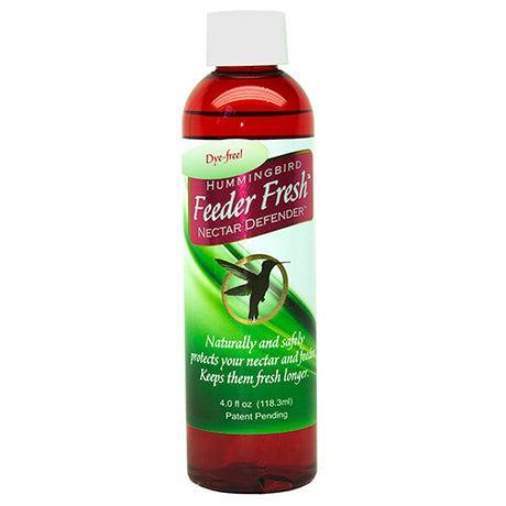 Bottle of Clear Feeder Fresh Nectar Defender with a label featuring a hummingbird icon, designed to keep hummingbird nectar fresh using natural micronutrients.