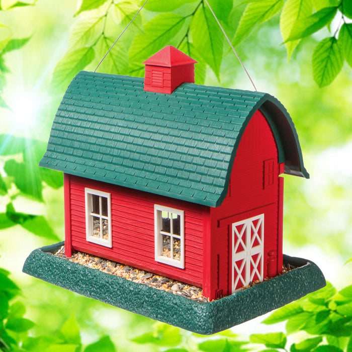 North States Red Barn Bird Feeder with a large feeding tray on both sides, green roof, and easy-fill cupola. Suitable for outdoor use.