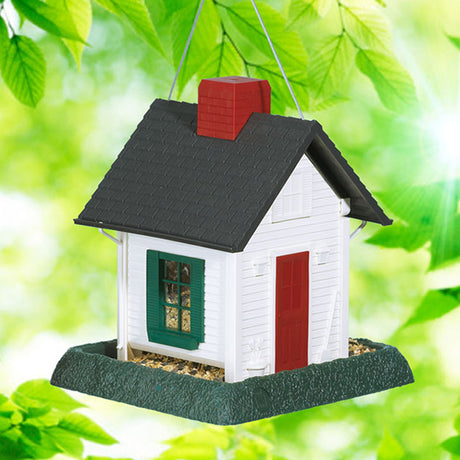 Small White Cottage Bird Feeder with red roof, clear window panes, lift-off chimney, and large feeding tray. Durable molded plastic, easy to clean and refill.