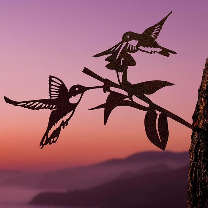 Silhouette metal sculpture of hummingbirds on a branch, Hummingbird Honeys, crafted from Corten Steel for garden decoration.