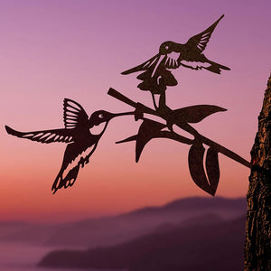 Silhouette metal sculpture of hummingbirds on a branch, Hummingbird Honeys, crafted from Corten Steel for garden decoration.