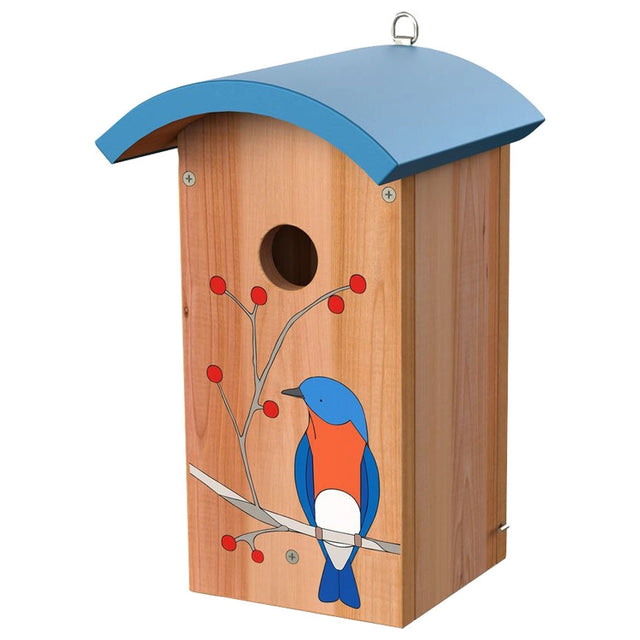 Wooden birdhouse with blue roof and painted bluebird on a white background