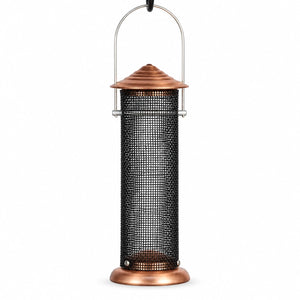 Mini copper Nyjer bird feeder with a fine black mesh tube, tiered roof, and rounded copper base on a white background.