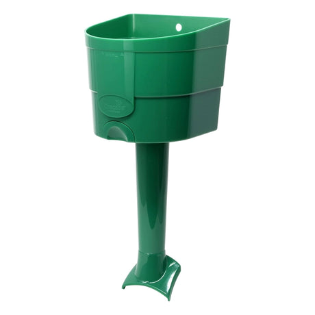 Green plastic bird seed scoop on a white background