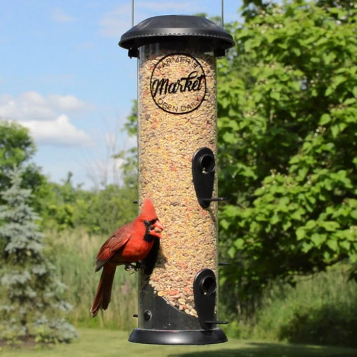 Farmhouse Easy Clean Feeder with a red bird eating from one of its six ports, highlighting the feeder's easy clean technology and efficient design.