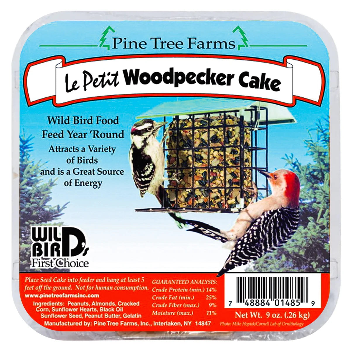 Le Petit Woodpecker Cake by Pine Tree Farms: 9 oz suet seed cake in a metal cage feeder, featuring woodpecker-preferred ingredients and feeding instructions.