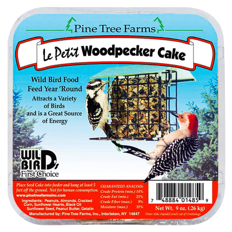 Le Petit Woodpecker Cake by Pine Tree Farms: 9 oz suet seed cake in a metal cage feeder, featuring woodpecker-preferred ingredients and feeding instructions.
