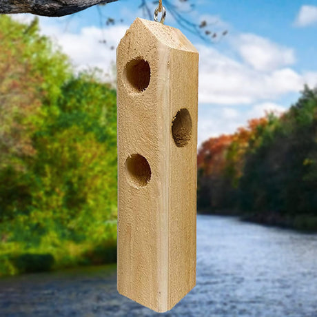 Log Jammer Hardwood Feeder: A wooden suet log feeder with multiple drilled holes for bird feeding, featuring natural wood and bark, handcrafted from hornbeam hardwood.