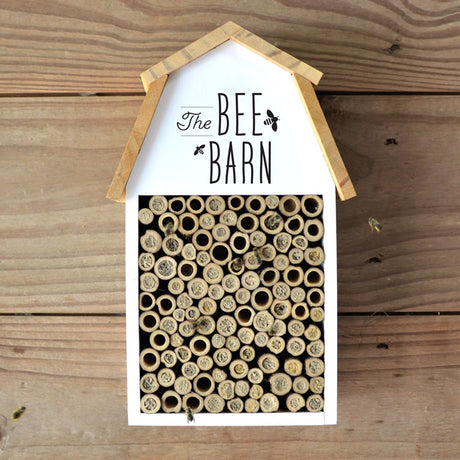 Farmhouse Bee Barn with hollow bamboo tubes for various solitary pollinators, designed to attract beneficial insects and birds; easy-mount keyhole on back.