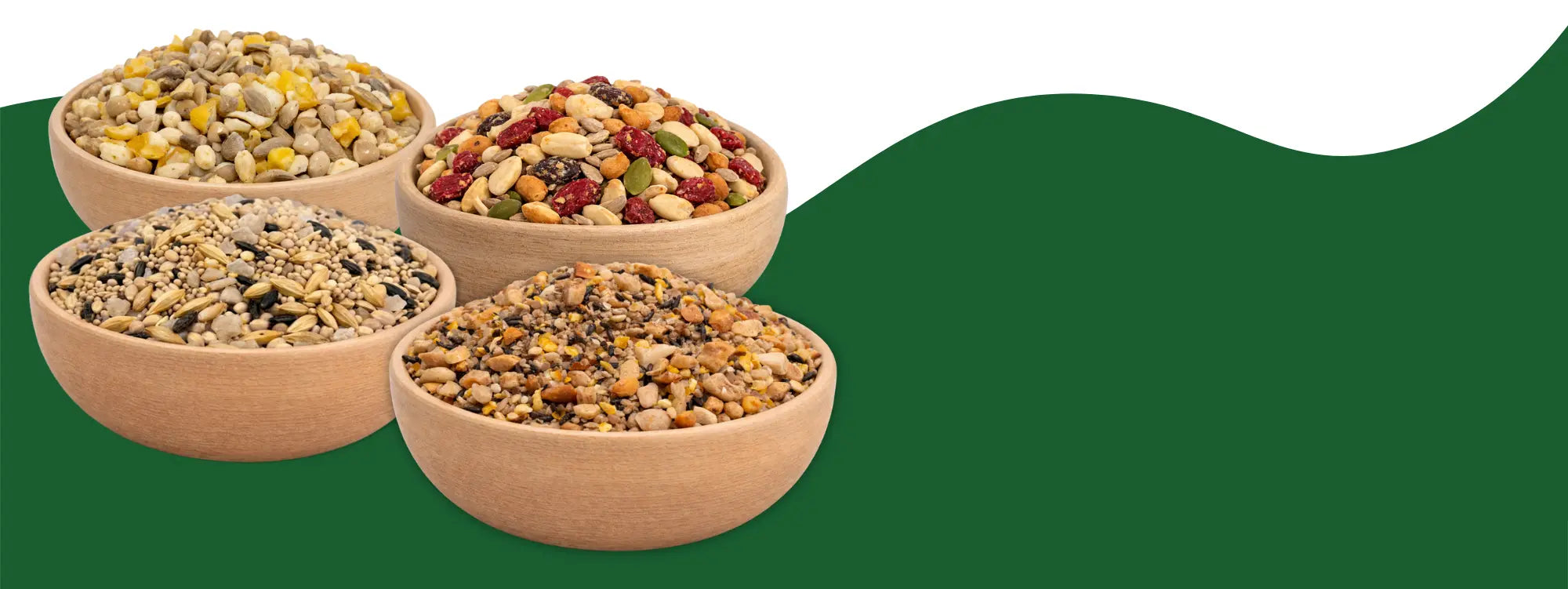 4 bowls of birdseed on a white and green background. 