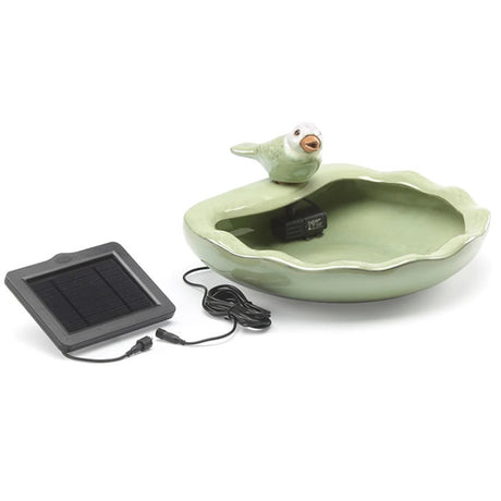 Ceramic Bird Solar Fountain with bird feature on water fountain; powered by a solar panel with 10 ft. cord, creating a continuous water flow.