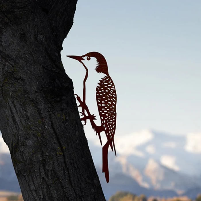 Metal Red-Bellied Woodpecker sculpture perched on a tree, crafted from durable Corten Steel, showcasing precision-cut details and designed for easy installation in gardens.