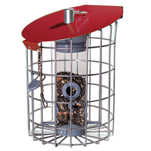 The Nuttery Roundhaus Seed Feeder, Red, features a rugged metal design with a red lid, clear tube, and four seed ports, deterring squirrels efficiently.