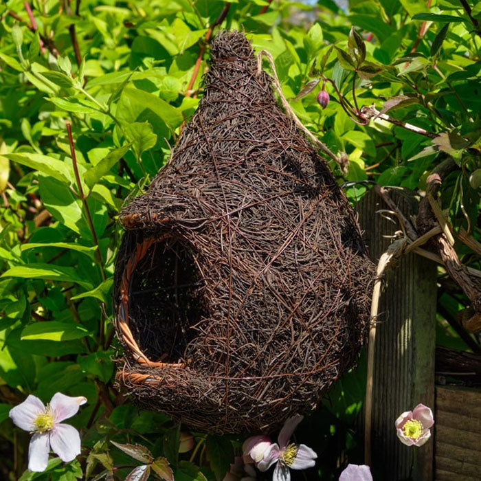 Hanging Roosting Nest Pocket for Small Birds, crafted from brushwood with a rattan doorstep, sturdy frame, and built-in drainage, perfect for garden bird shelter.