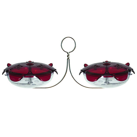 Droll Yankees Ruby Sipper Duo Hanging Feeder with two clear nectar dishes on a stainless steel bracket for hummingbirds.