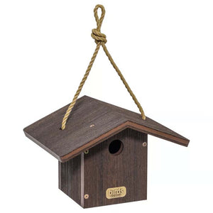 Wren House, Brazilian Walnut: A rustic birdhouse with a 1-1/4 inch entrance hole, nylon hanging rope, and side door for easy cleaning.