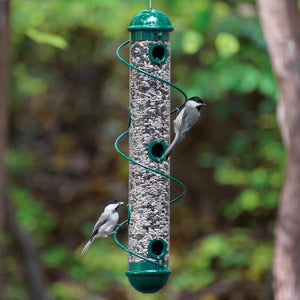 17 Green Spiral Sunflower Seed Feeder with seven feeding ports, featuring birds perched on the spiral perch, and clear plastic for easy seed level viewing.