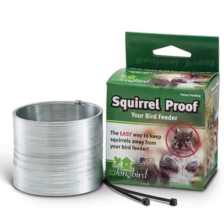 Squirrel Proof Spring Device shown with metal wire box and feeder; deters squirrels using spring-loaded motion. Includes zip ties for securing to bird feeder pole.