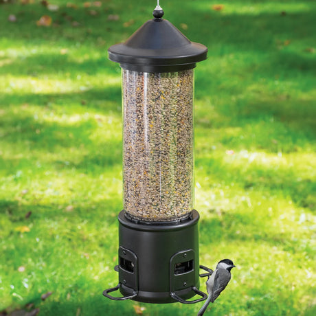 Squirrel Shield Choice Metal Bird Feeder with a bird feeding. Features weight-activated perches and a sliding metal sleeve to deter squirrels.