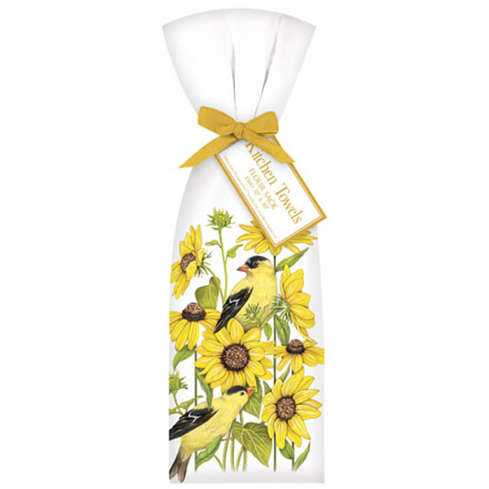 Sunflower Finch Towel Set featuring white towels adorned with yellow birds and sunflowers, tied with a matching bow. Includes two 30x30 inch towels.