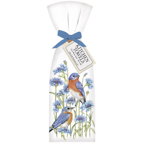 Meadow Bluebird Towel Set: White towels featuring bluebirds and flowers, tied with a matching bow. Perfect for adding a nature-inspired touch to your home.