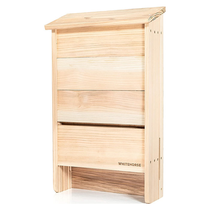 Wooden Bat House with three chambers, featuring interlocking joints and a large landing pad for bats. Made from 100% western cedar wood, ideal for supporting bat populations.