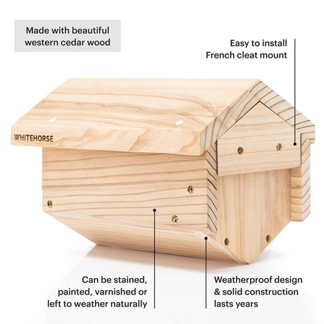 Bee House with bamboo tubes, wooden construction, and protective overhang. Designed to support bee populations, includes mounting cleat, screws, and installation guide.