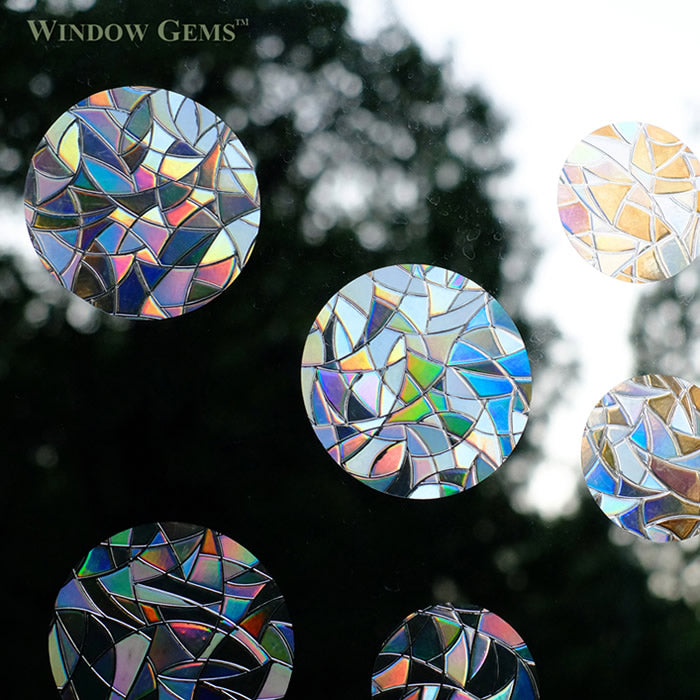 Circles Window Gems, Set of 10, prismatic decals on a window, designed to prevent bird strikes and add beauty.