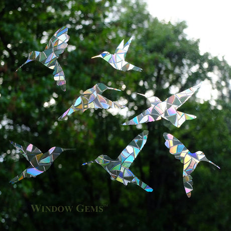 Hummingbird Window Gems, Set of 7: Colorful hummingbird decals designed to stick on windows, preventing bird strikes and adding decorative charm.