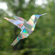 Hummingbird Window Gems, Set of 7, on a window; decals to prevent bird strikes and add elegant touch to your home or office.