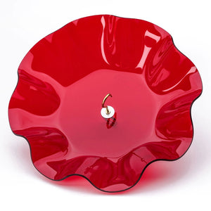 Red Swirl Weather Guard with scalloped edges and a metal hook, designed to protect bird feeders from rain and snow.