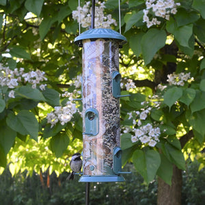 Vintage Deluxe Easy Clean Feeder with a bird perched, featuring six ports, durable powder-coated metal, and built-in drainage for easy cleaning and filling.