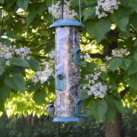 Vintage Deluxe Easy Clean Feeder with a bird perched, featuring six ports, durable powder-coated metal, and built-in drainage for easy cleaning and filling.