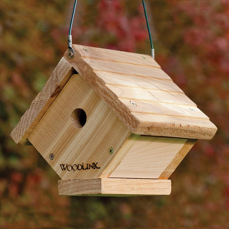 Cedar Traditional Wren House with 1-1/4 inch entry hole, hanging cable, built-in ventilation, and drainage, made from weather-resistant cedar wood.