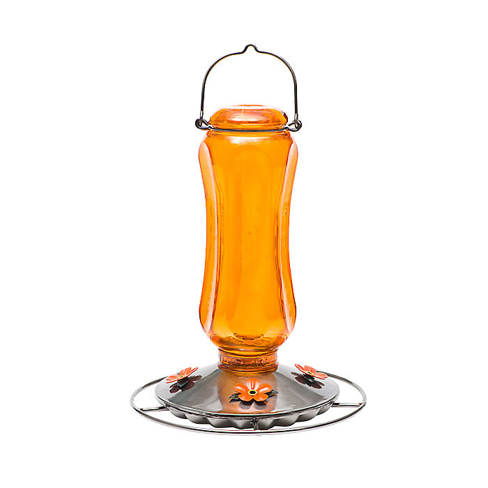 Vintage Carnival Oriole Feeder: Close-up of orange-tinted glass feeder with four flower-shaped feeding ports, wraparound perch, and metal hanger, designed for attracting orioles.