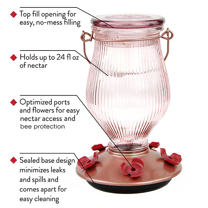 Rose Gold Top-Fill Glass Hummingbird Feeder with five red flower-shaped feeding ports, see-through striped glass jar, and easy-to-remove cap for no-mess filling.