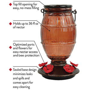 Prohibition Top-Fill Glass Hummingbird Feeder, featuring a barrel-like design with five red flower feeding ports on a two-piece speckled metal and black plastic base.