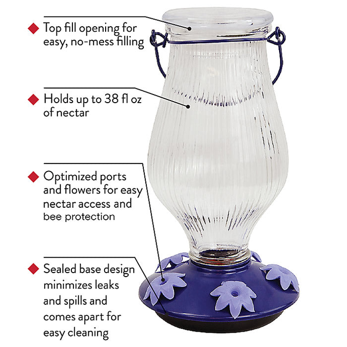 Grand Oasis Top-Fill Glass Hummingbird Feeder close-up showing purple petunia-shaped feeding ports and clear striped glass reservoir with easy-to-remove cap for filling and cleaning.