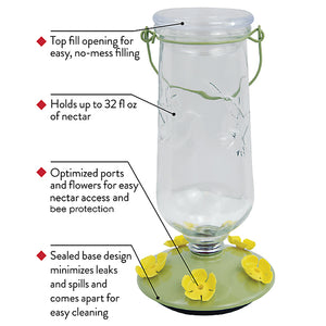 Perky-Pet Desert Bloom Top-Fill Hummingbird Feeder with glass reservoir, five yellow flower feeding ports, and bee guards, accompanied by usage instructions.